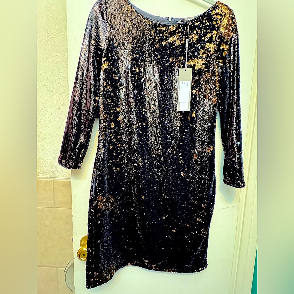 Sequined tea length dress for pageants, prom or special occasions.